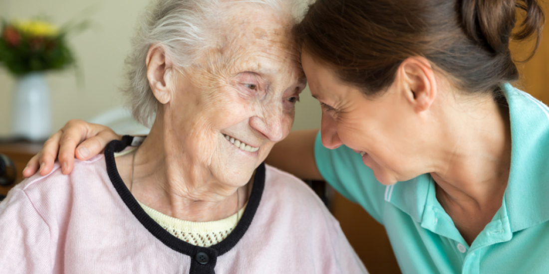 Carer with lady living with dementia